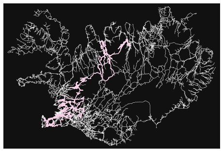 A plot with a black background, and the all the roads in iceland plotted in dark grey. A pink line traces a random walk 10 times length of my vacation through the country. The walk is clustered around the Southwest