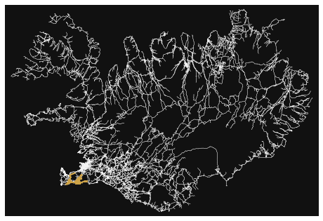 A plot with a black background, and the all the roads in iceland plotted in dark grey. A gold line traces a random walk the same length as my vacation through the country. The walk is clustered around Reykjavik